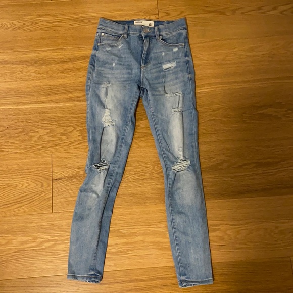 Garage blue light wash ripped skinny jeans